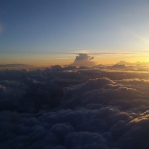 Sunset over clouds
